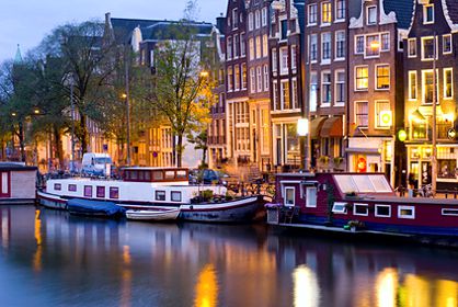 Incentiveziel Amsterdam mit Gracht und Hausbooten