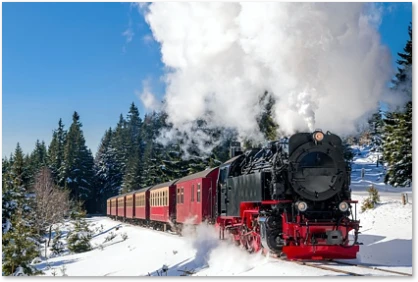 Brockenbahn im Harz in Winterlandschaft Dampflok im Rahmen eines Firmenevents auf dem Weg zum Brocken